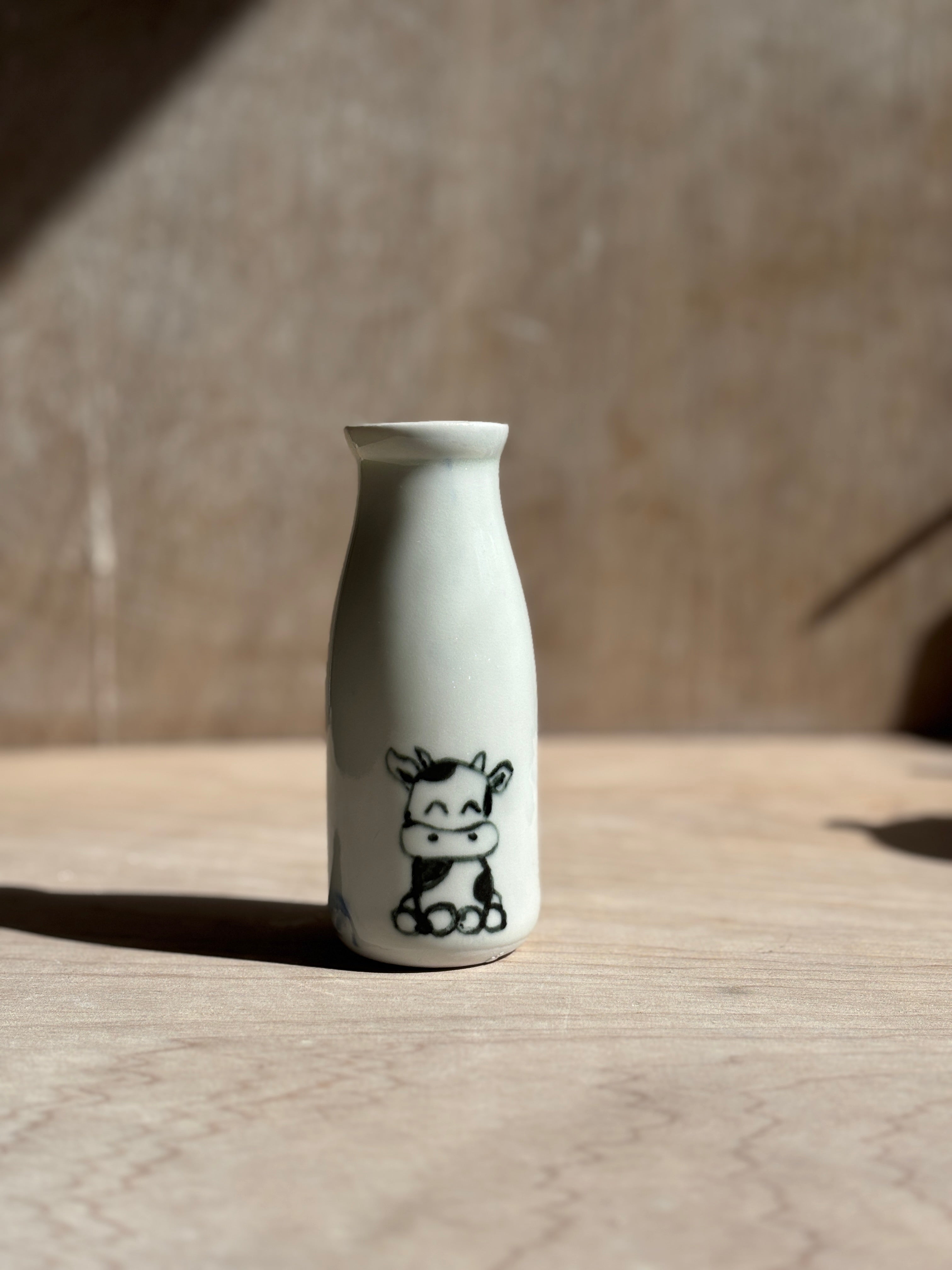 Porcelain Milk Bottles
